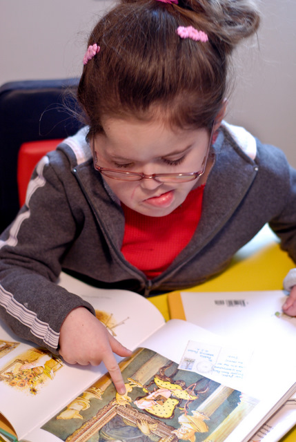 Ella really gets into looking at books and making up stories (now if we could only understand them)